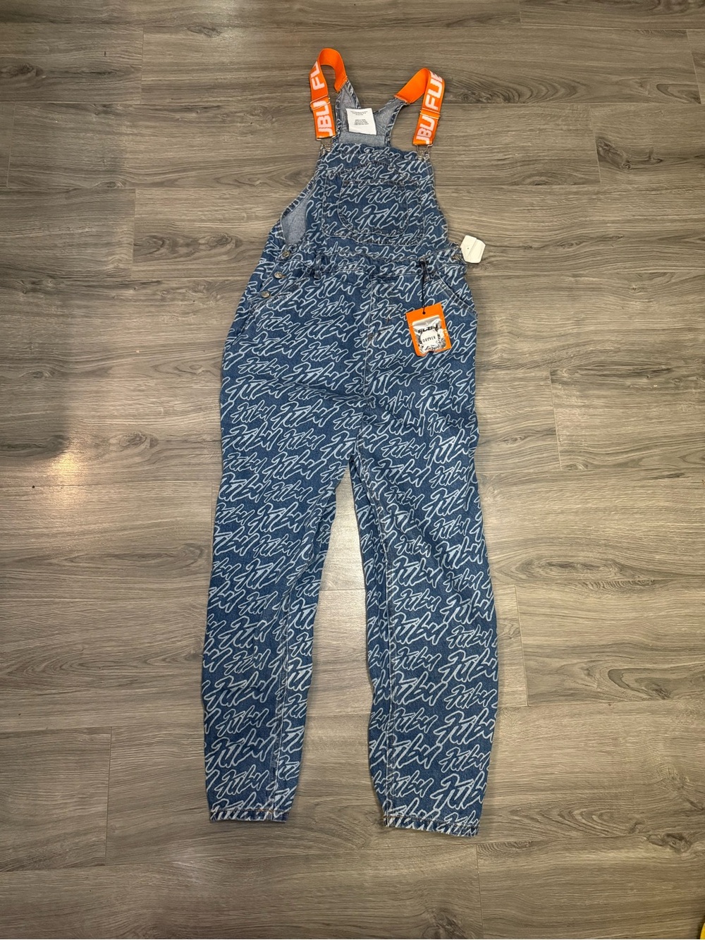 FUBU Blue Denim Overalls with White Script and Orange Tag